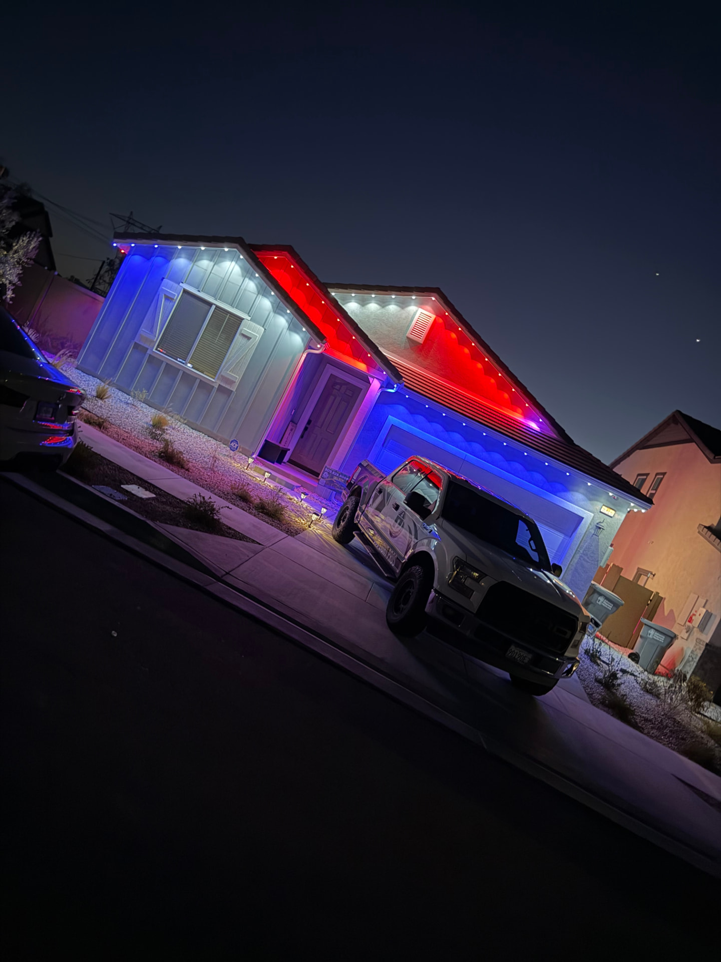 Home lit in red, white and blue permanent LED lighting